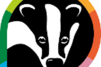 the wildlife trusts badger logo with a rainbow border