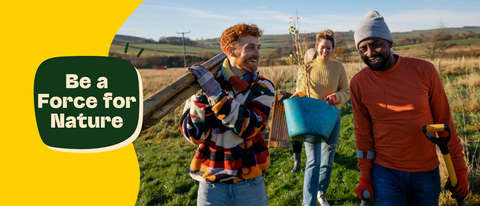 Three diverse volunteers planting trees in a field, accompanied by "Be a Force for Nature" call to action.