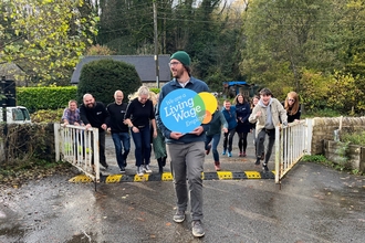 DWT staff showcasing living wage