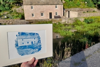 A sketch of Aqueduct Cottage in front of the actual Aqueduct Cottage