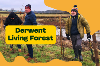 derwent living forest image of men laughing and planting trees next to a river