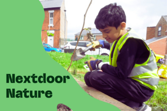 nextdoor nature title with young boy in a high vis vest digging a hole in a raised bed for a plant