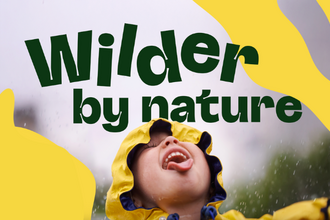 A child in a yellow raincoat joyfully looks up, sticking out their tongue to catch raindrops. Bold green text above reads "Wilder by nature" against a bright yellow abstract background.