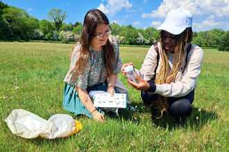 students monitoring grassland