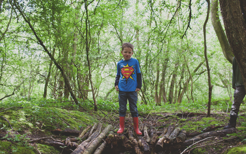 Edward stands on a pile of branches