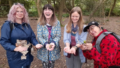Wild Wellbeing Participants with their nature treasures