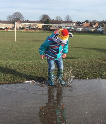 Child & puddles